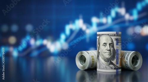 A stack of twenty dollar bills sitting on top of a reflective surface.