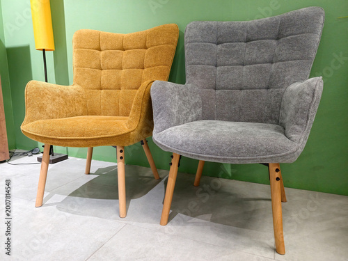 Fotografie Sleek grey and yellow armchair pair for ultimate comfort, available at the furni
