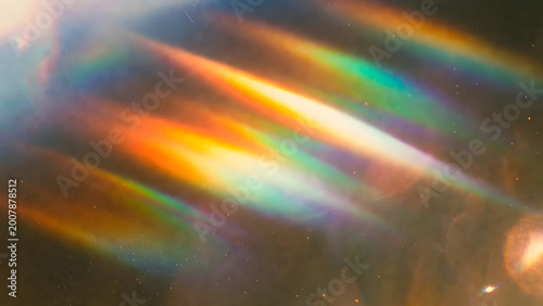 vibrant abstract oil film with rainbow light refraction on water surface