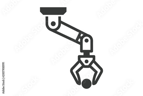 Obraz na plátně Robot claw gripping a ball in industrial setting with industrial automation tech