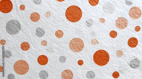 Watercolor polka dot pattern with orange and gray circles on white paper