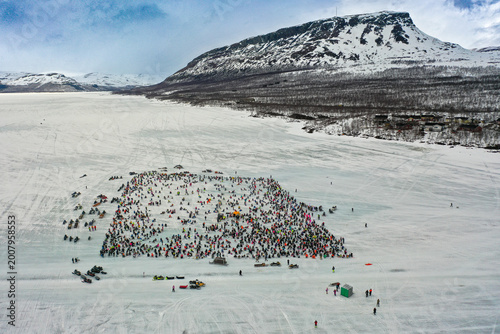Fishing competition in Finland on a frozen lake