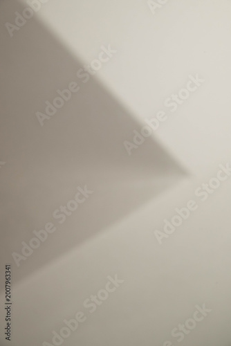 Bright Neutral Wall With Soft Gradients And Light Texture Detail