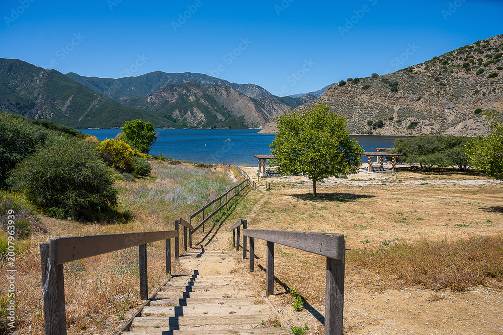 Fototapeta premium Scenic Path and Wooden Fence Leading to the Shore of Pyramid Lake California