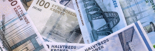 Photos Danish krone money bills pile on table