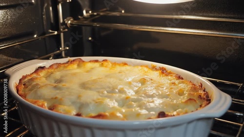 Casserole baking inside oven close view