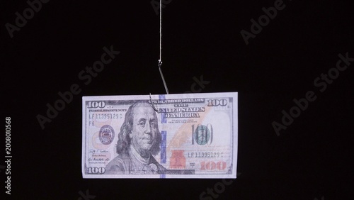 Cuadro en lienzo One hundred dollar bill dangling from a fishing hook, illustrating concepts of f