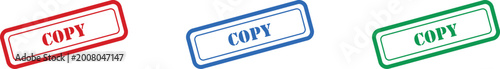 Foto Three angled rubber stamps displaying the word copy in vivid red, blue, and gree