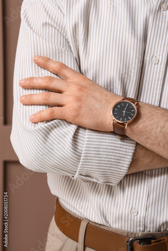 Man with stylish wristwatch...
