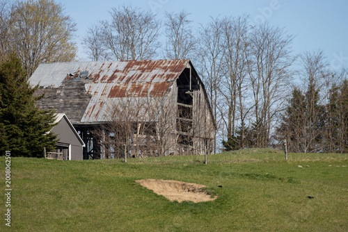 Decrepit barn on a sunny day.