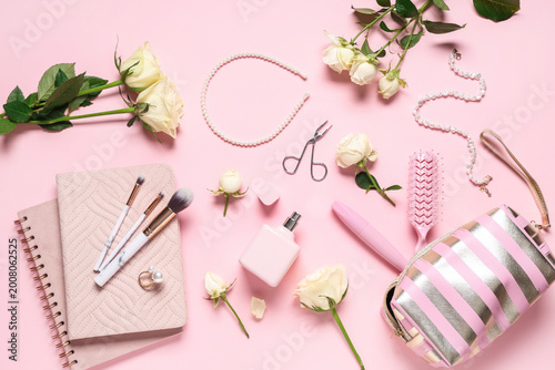 Fotografi Composition with white rose flowers, makeup products and bottle of perfume on pi