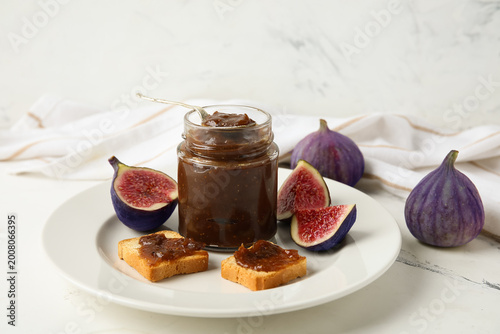 Plate with jar of sweet fig...