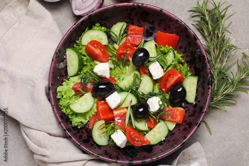 Bowl of tasty Greek salad, ...