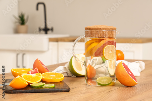 Jug with citrus lemonade an...