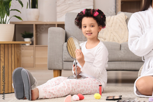 Little Asian girl with hair...