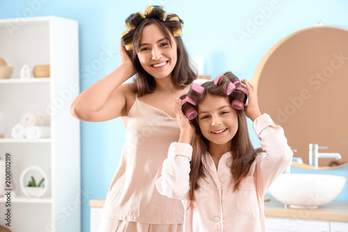 Little girl with her mother...
