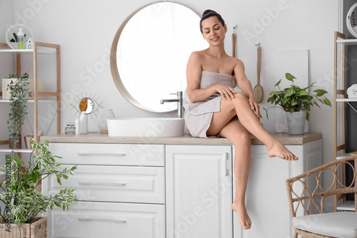 Young woman after shower in...