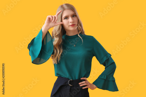 Young woman holding somethi...