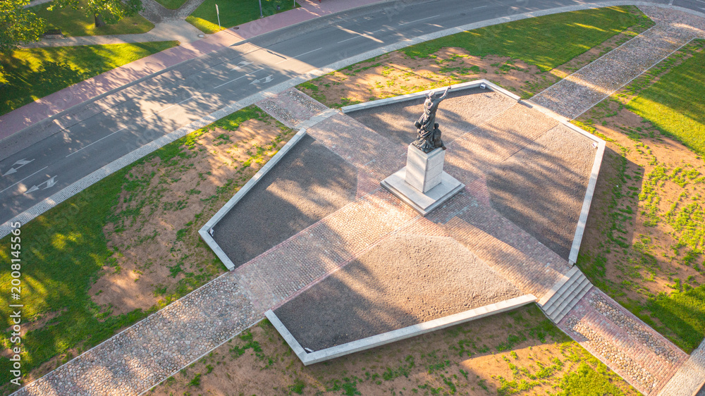 Fototapeta premium Rezekne, Latgale ,Latvija. Aerial photo from drone to of Rezekne city center at sunrise. (Series)