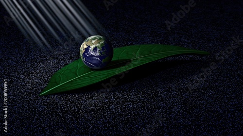 Earth resting on a green leaf with light shining down