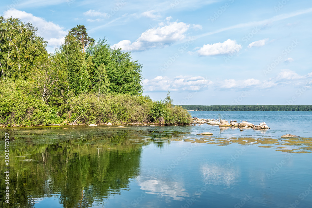 Fototapeta premium Blue lake with cloudy sky, natural background