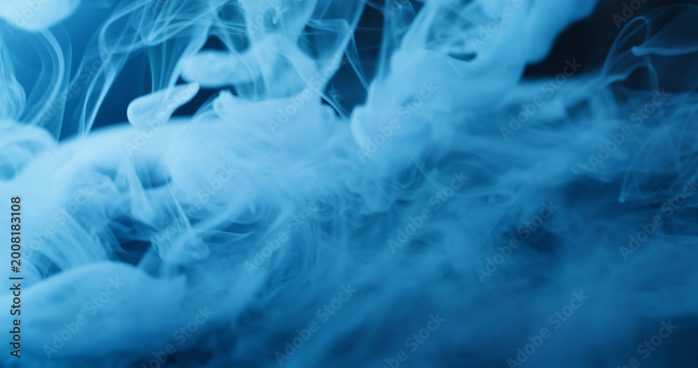 Obraz premium Blue water smoke. Splash drop. Defocused cold color fluid cascade texture steam smog spreading on abstract art acrylic background.
