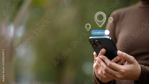 Фотография Mobile location tracking and GPS navigation concept with smartphone and geolocat