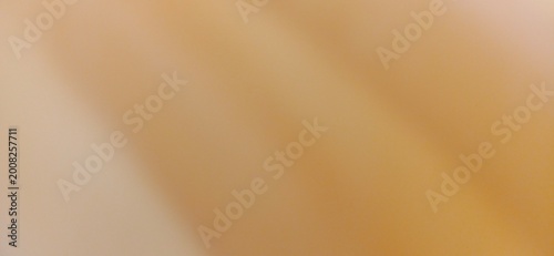 Abstract beige background featuring a soft gradient texture with smooth light brown tones for modern graphic design project layouts