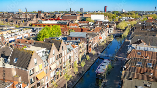 Delft town aerial drone view from above, typical Dutch city skyline with canals and houses, Delft architecture, Holland, the Netherlands