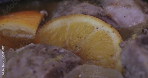 Macro of Simmering Pork with Orange Slices 