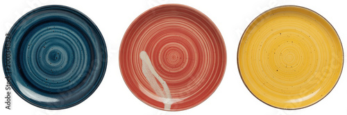 Three ceramic plates in blue, red, and yellow colors arranged on a plain white background