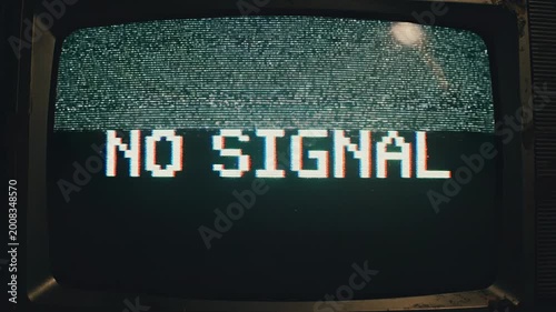 A vintage television screen displaying no signal.