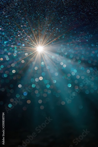 Point light radiating through bokeh in dark space background