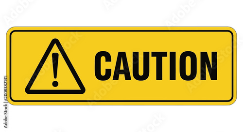 Foto A caution sign with a warning triangle is displayed prominently outdoors on a sign