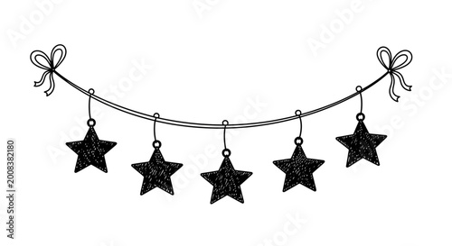 Slika na platnu Black star decorations hang from a curved metal wire with bows on either end
