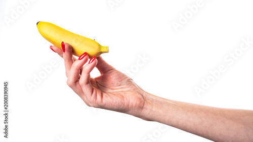 Photography Baby banana or small banana in hands isolated on white background