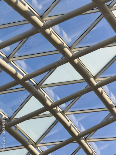 Close-up of contemporary building's glass and steel ceiling