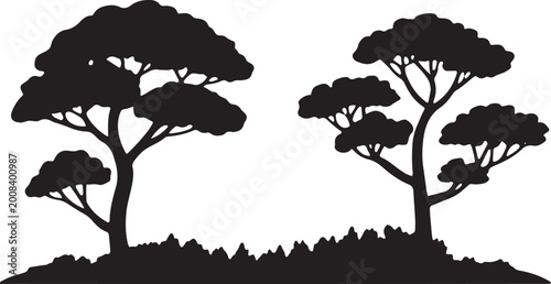 Savanna trees silhouette with spreading canopy and rugged ground texture for wild nature design