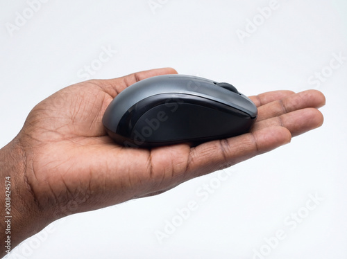 hand holding a pc mouse