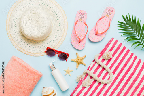 Composition with stylish beach accessories on colored background, top view. Beach fashion flat lay, summer concept. Trendy colors