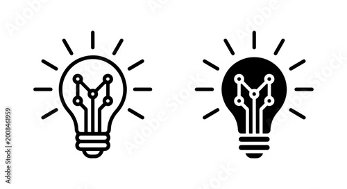 Fotografie vector black and white outline of two different styled illuminated bulbs with ci