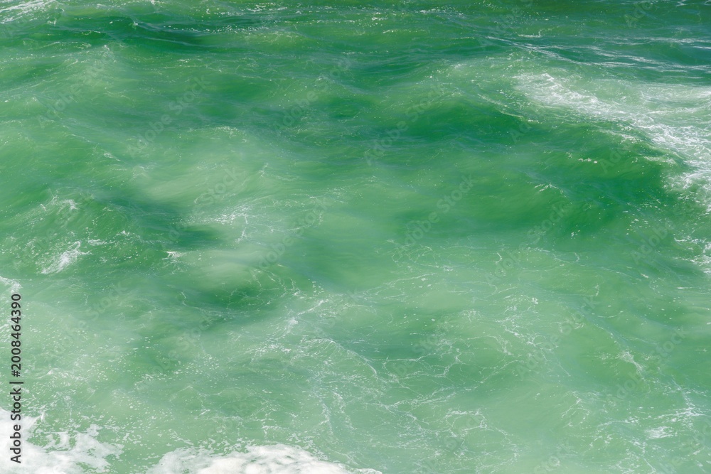 Obraz premium Turquoise ocean waves close up