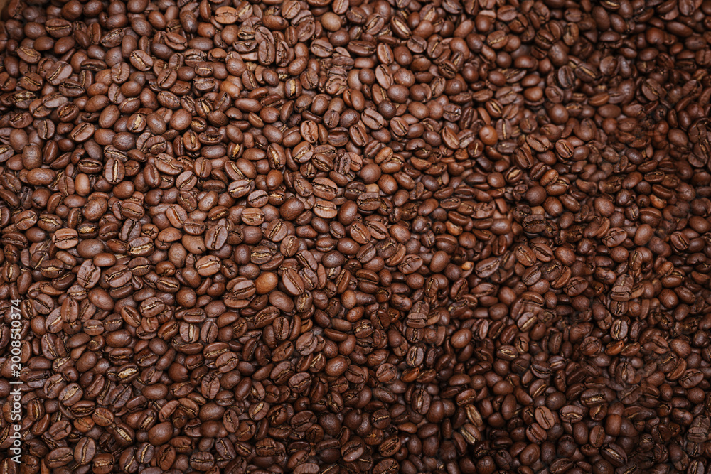 Obraz premium Top-Down Full Frame Texture of Freshly Roasted Aromatic Coffee Beans