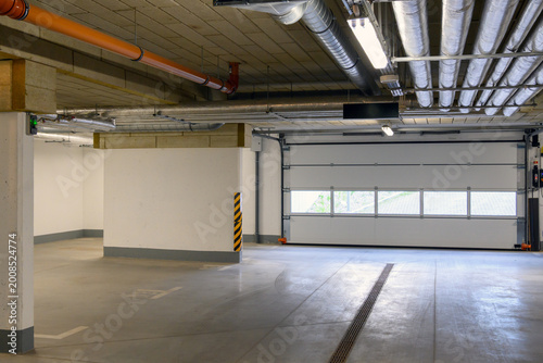 Typical underground car parking garage in a modern apartment house