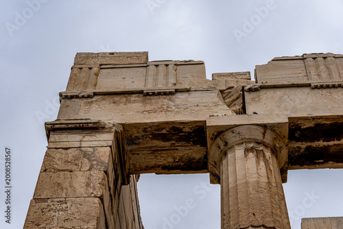 фотографія Close-up of the Propylaea ancient gateway showing Doric columns and entablature with triglyphs