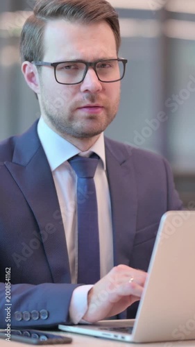 No Gesture by Head Shake by Businessman at Work