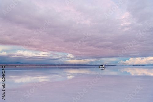Serene uyuni salt flat landscape in bolivia with reflection of sky