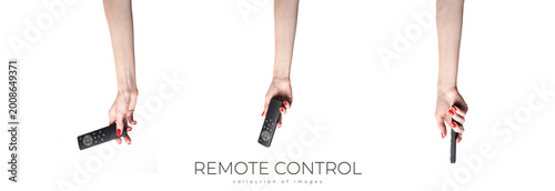 Hand holding audio and television remote control isolated on white background. Cliping Path.