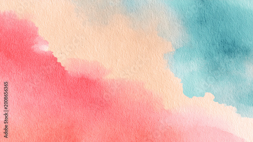 Abstract watercolor background with soft pink and blue paint washes on textured paper