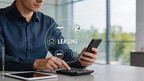 Businessman using smartphone tablet and calculator for financial analysis digital leasing concept with holographic interface displaying icons for car rental property lease and